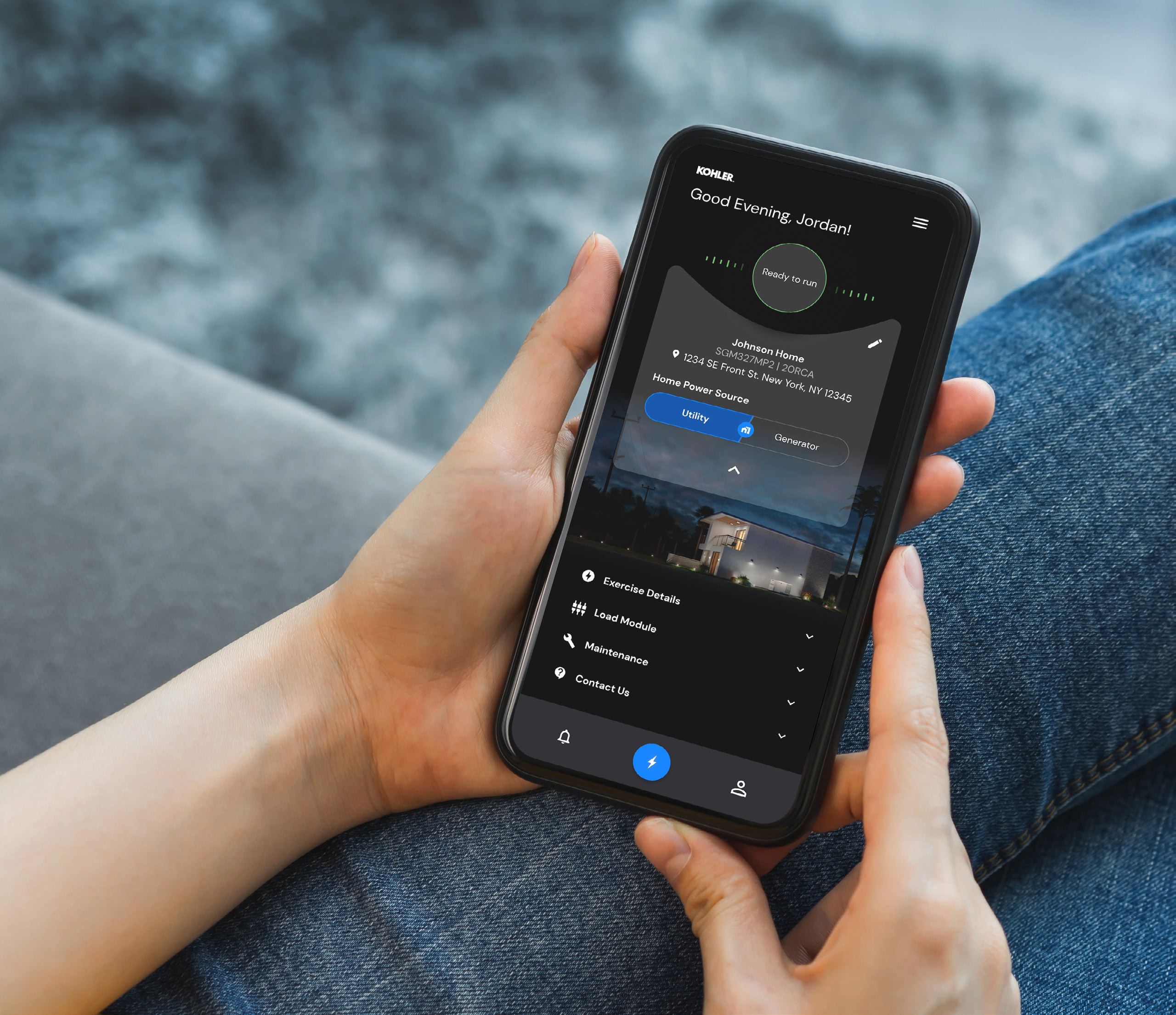 Homeowner checking generator status on the Kohler Energy Management app